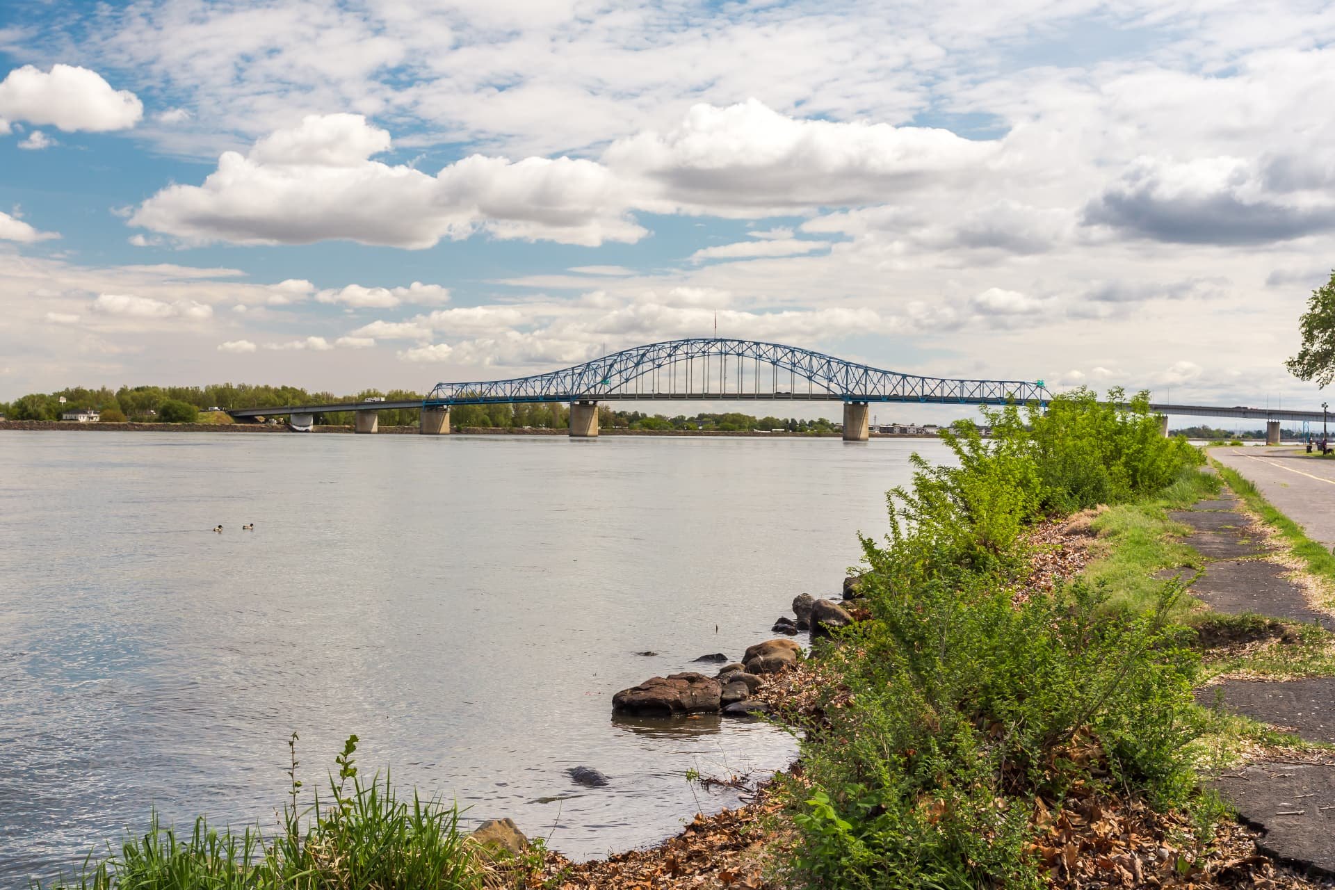 The Blue Bridge crossing the Columbia River at Kennewick, Washington, seen from the riverfront path