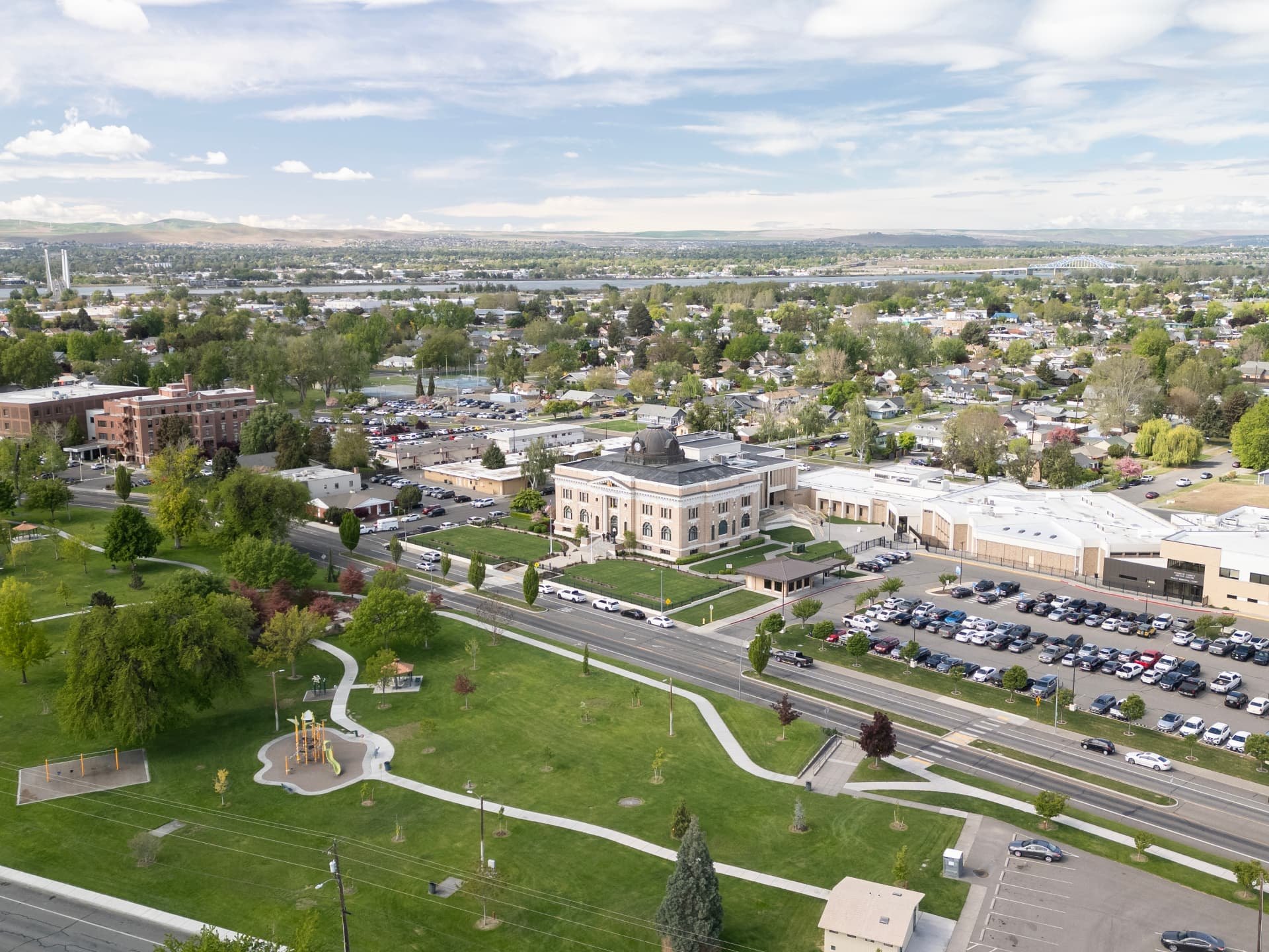 Aerial view of the Franklin County courthouse and civic district in Pasco, Washington, with the Columbia River beyond